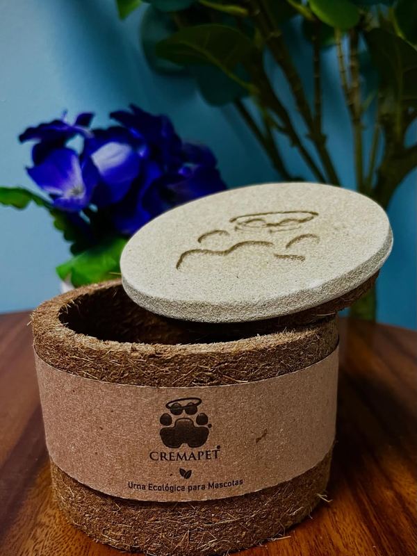 Urna ecológica con tapa de huella y logo de Cremapet